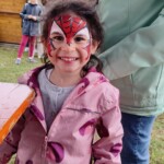 Kind mit Spiderman Schminke